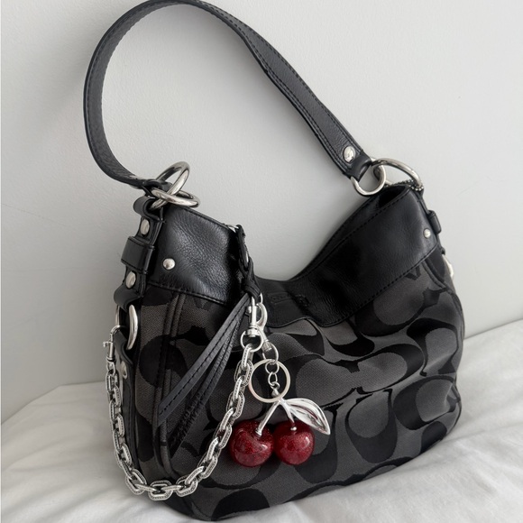 Coach Handbags - vintage Coach Optic Canvas Zoe Shoulder Bag